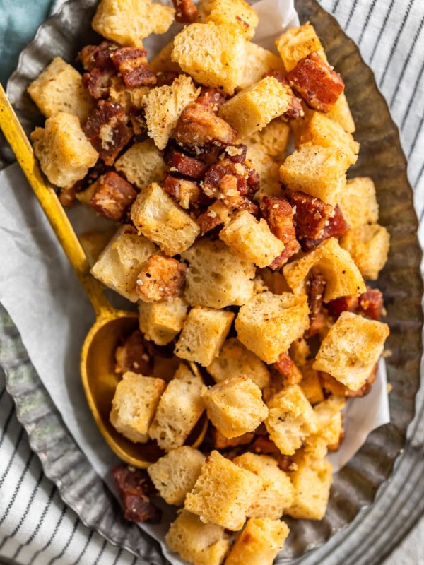 Bacon croutons are the perfect way to add some extra flavor to any soup or salad. This homemade croutons recipe is so easy to make! Baked croutons with the added taste of bacon. What could be better?!