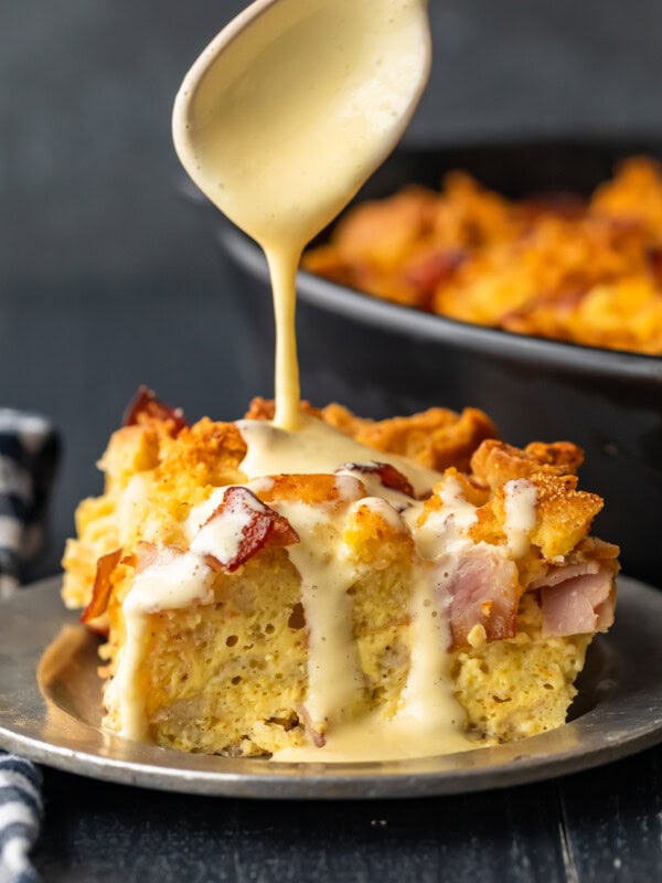 Eggs Benedict Casserole has all the flavor you love from the classic dish, mixed into one super tasty breakfast casserole. This EASY eggs benedict recipe is made with english muffins, filled with ham, and topped off with a simple eggs benedict sauce. This makes the perfect Mother's Day or Easter brunch!