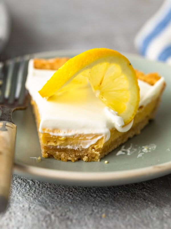 Sour Cream Lemon Pie is perfectly tart and creamy. This easy lemon pie recipe is filled with simple flavors that mix together beautifully. The lemon pie filling, saltine cracker pie crust, and sour cream topping combine to create the most delicious lemon tart for spring time!