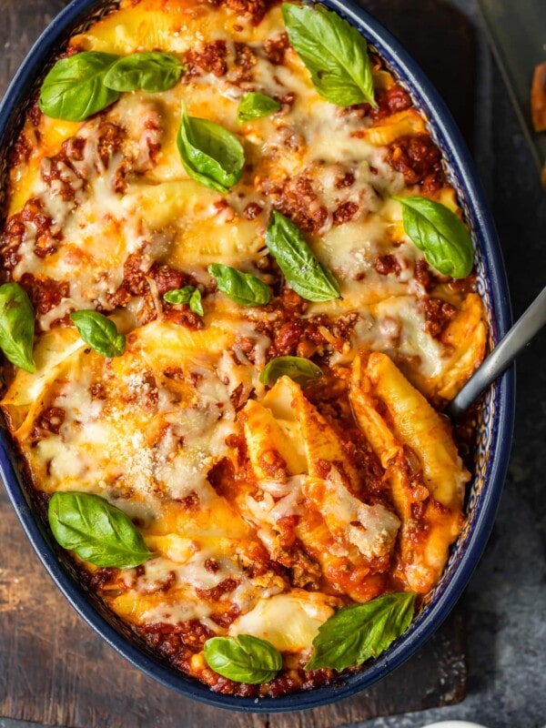 italian stuffed shells in a dish with spoon