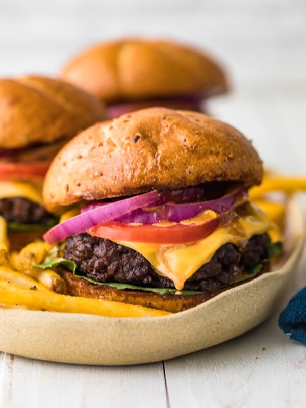 grillled cheeseburgers on a plate