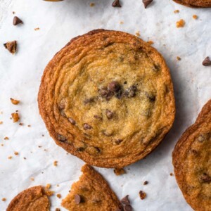 overhead picture of giant brown sugar chocolate chip cookie on table