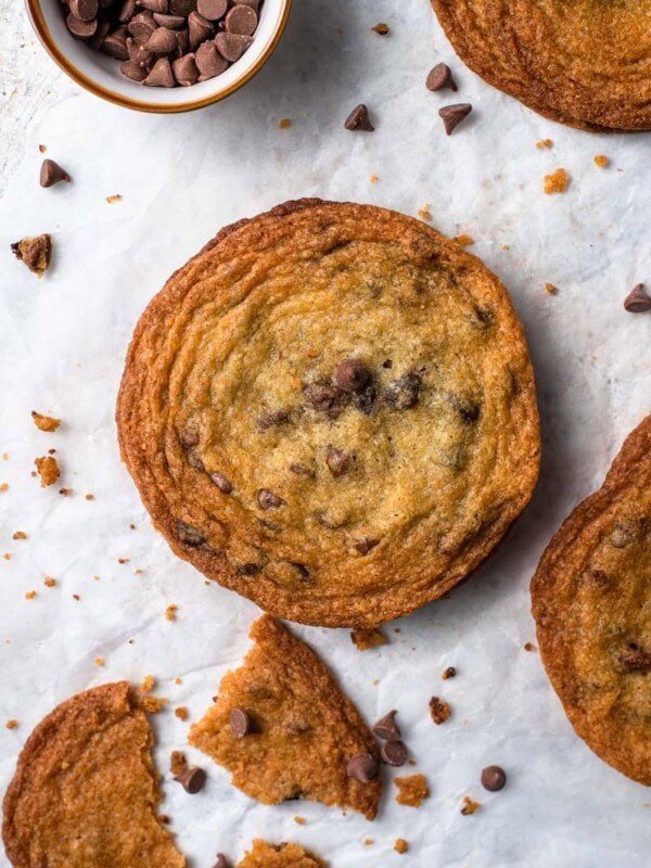 overhead picture of giant brown sugar chocolate chip cookie on table