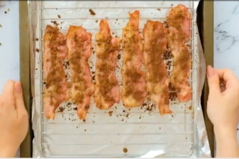 sprinkle brown sugar spice mix on each slice of bacon strips