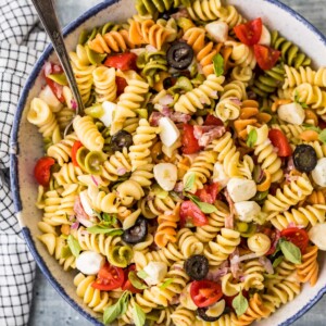 italian pasta salad in a bowl with a spoon