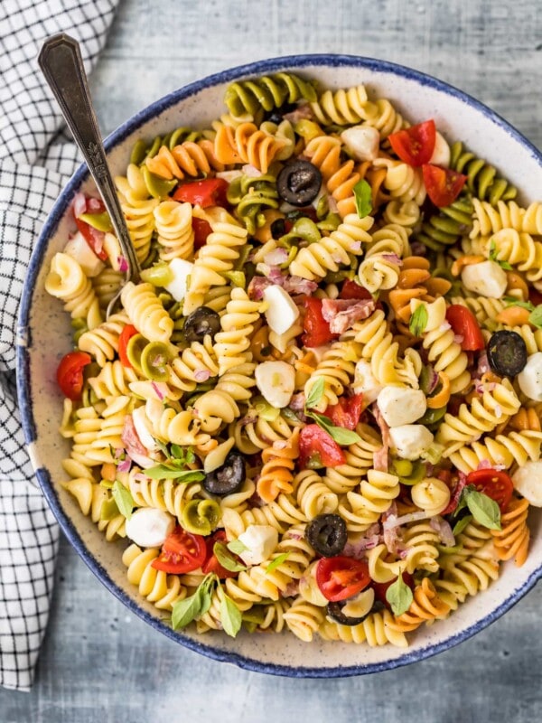 italian pasta salad in a bowl with a spoon