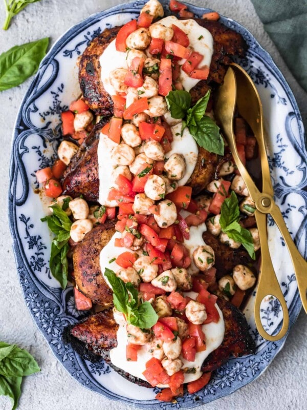 grilled caprese bruschetta chicken on a plate