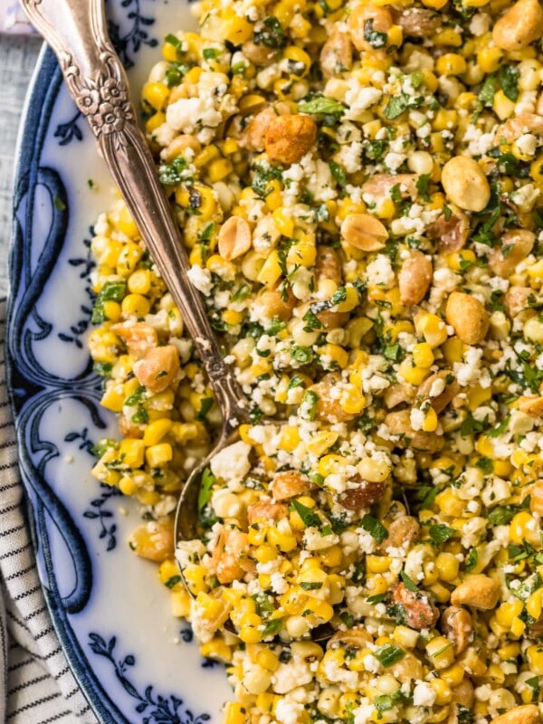 grilled corn salad in a bowl with a spoon