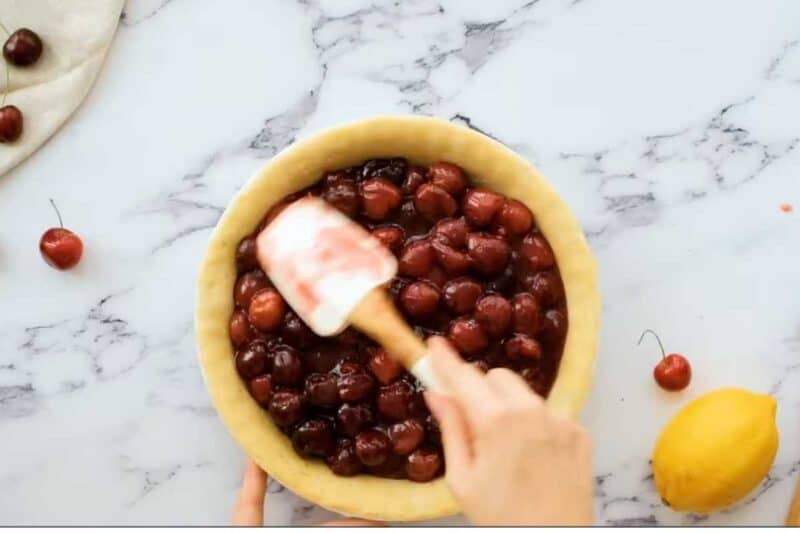 pour the cherry pie filling into the premade crust