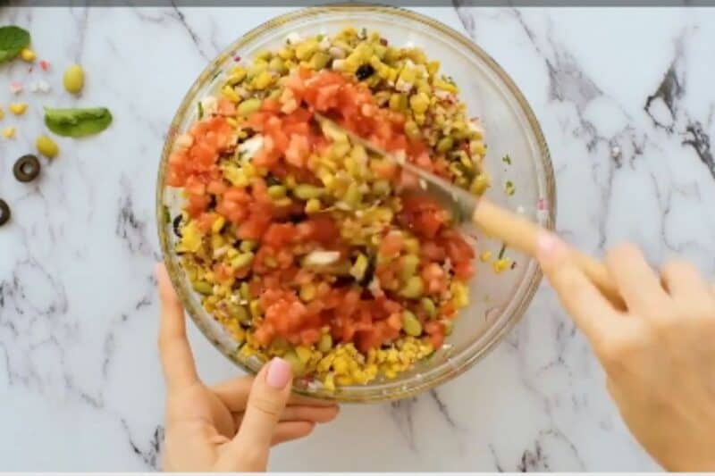 while serving add chopped tomatoes and mix