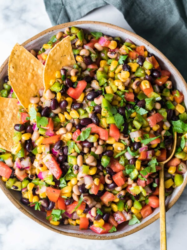 cowboy caviar in pan with chips