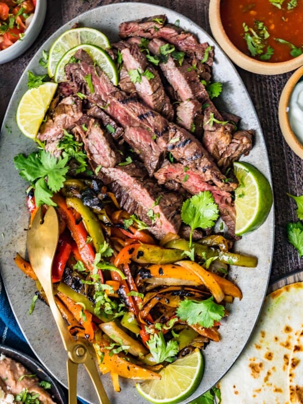 sliced steak and vegetables on a plate