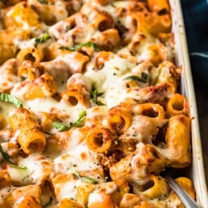 A baked rigatoni casserole dish packed with cheese.