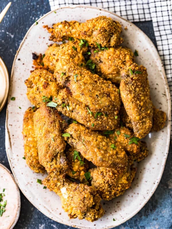 garlic parmesan wings on a white plate