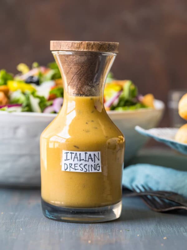 a bottle of italian dressing on a table