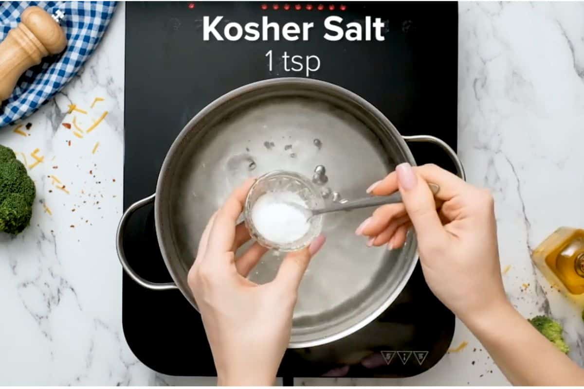 boiling water in a large pot with salt