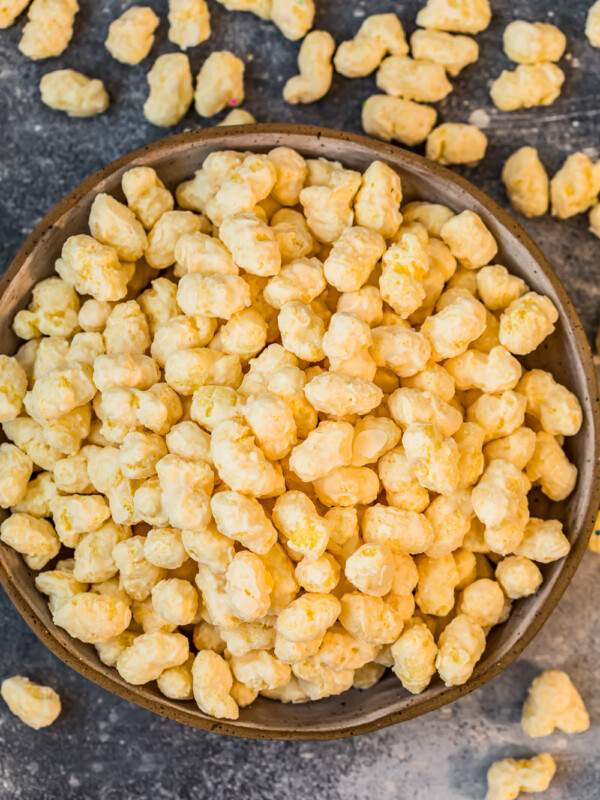 candied corn puff snack mix in bowl