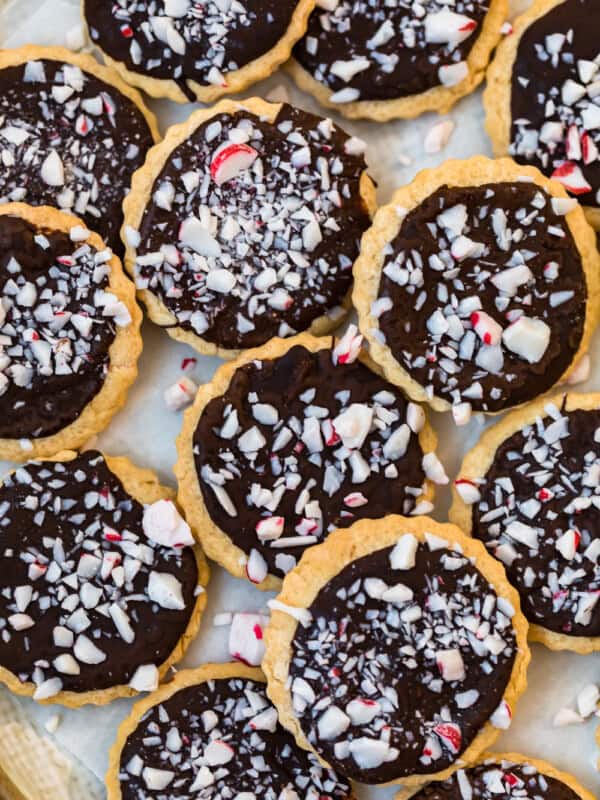 copycat pepperidge farm milano cookies topped with crushed peppermint on a plate