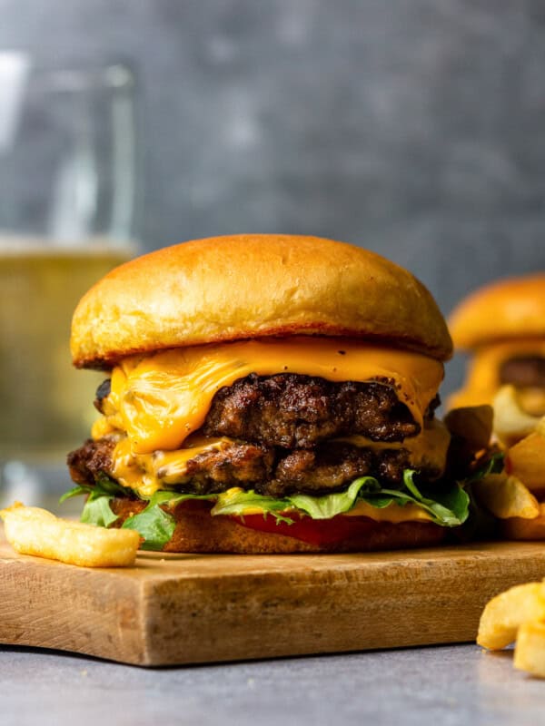 smash burger on cutting board