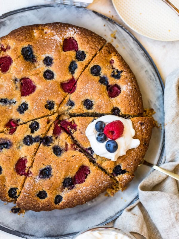 berry muffin coffee cake with whip cream on top