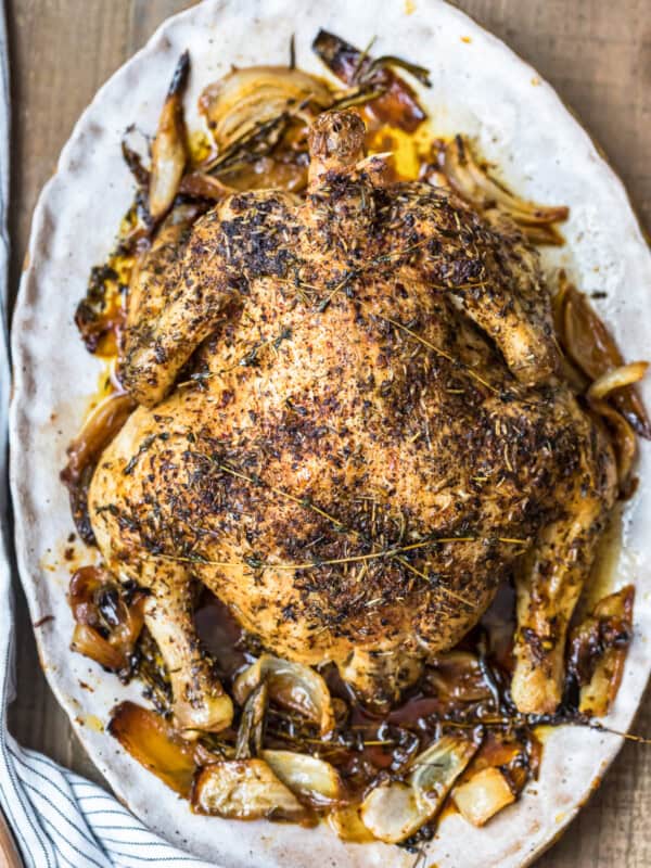 whole roasted chicken with herbs de provence on platter