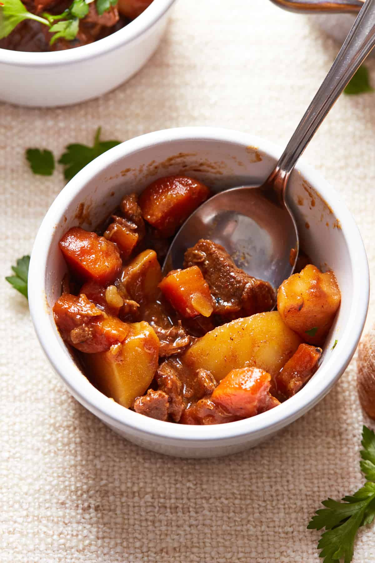 A serving of red wine beef stew in a bowl.