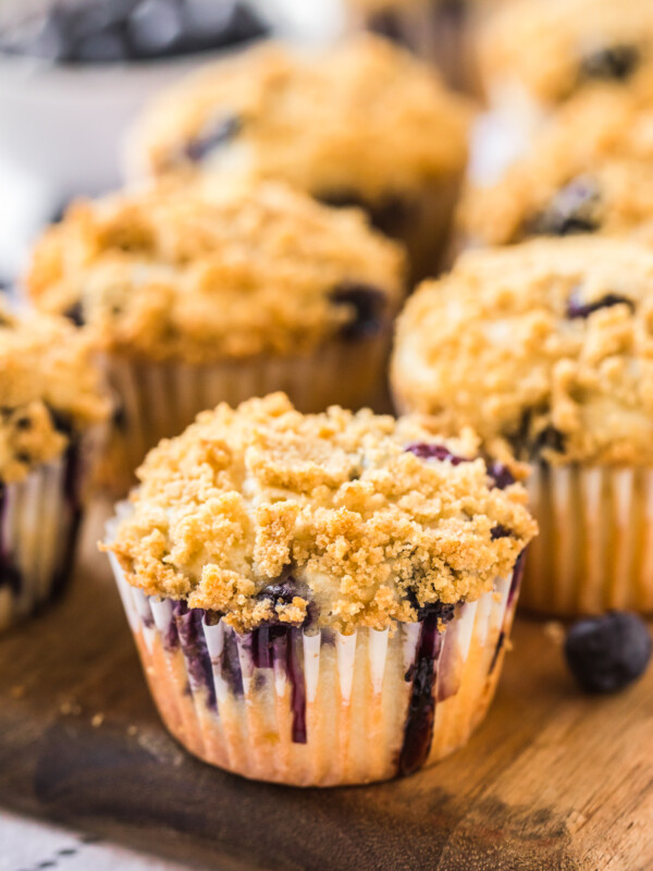 blueberry muffins on cutting board