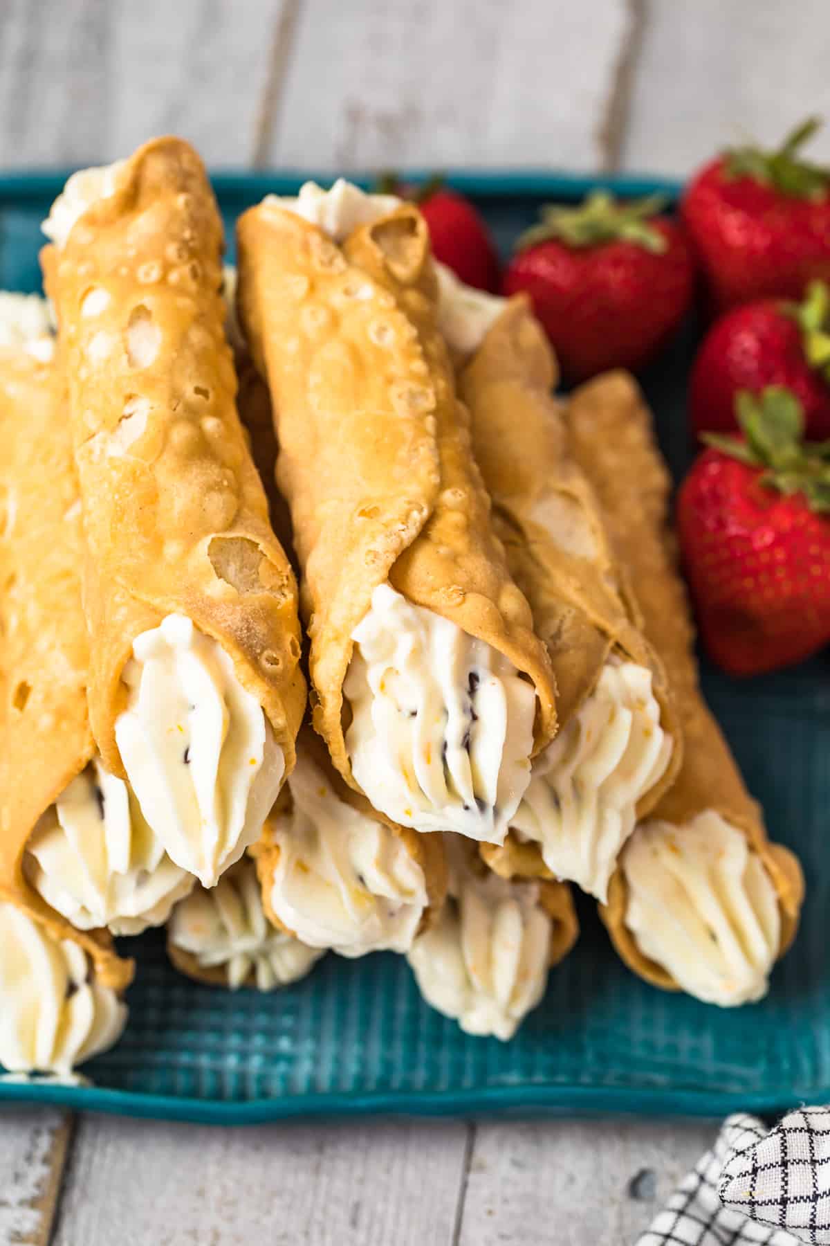 overhead image of cannolis filled with homemade cannoli cream