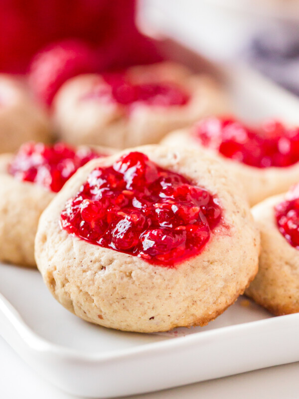 up close image of raspberry jam thumbprint cookies