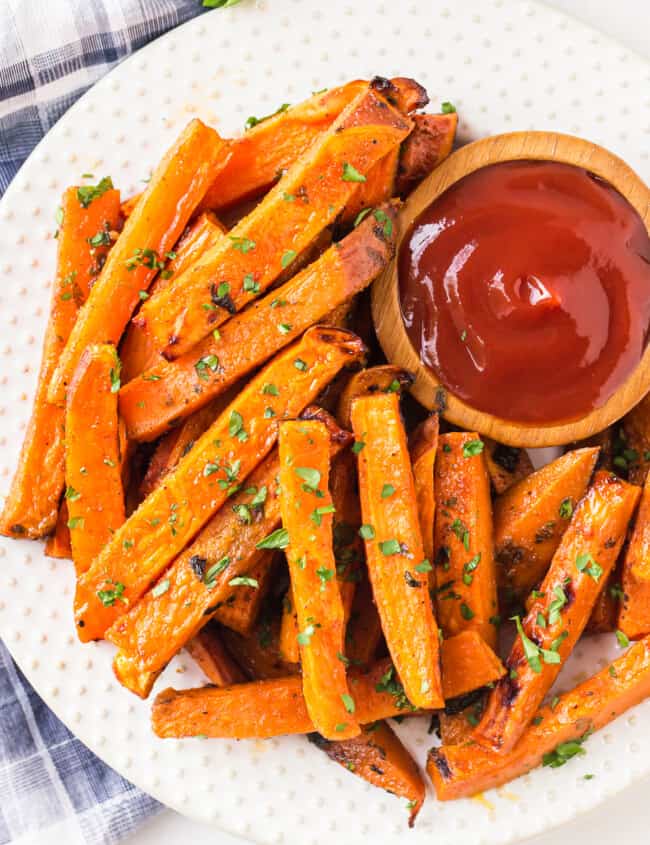 overhead image of sweet potato fries on plate with ketchup