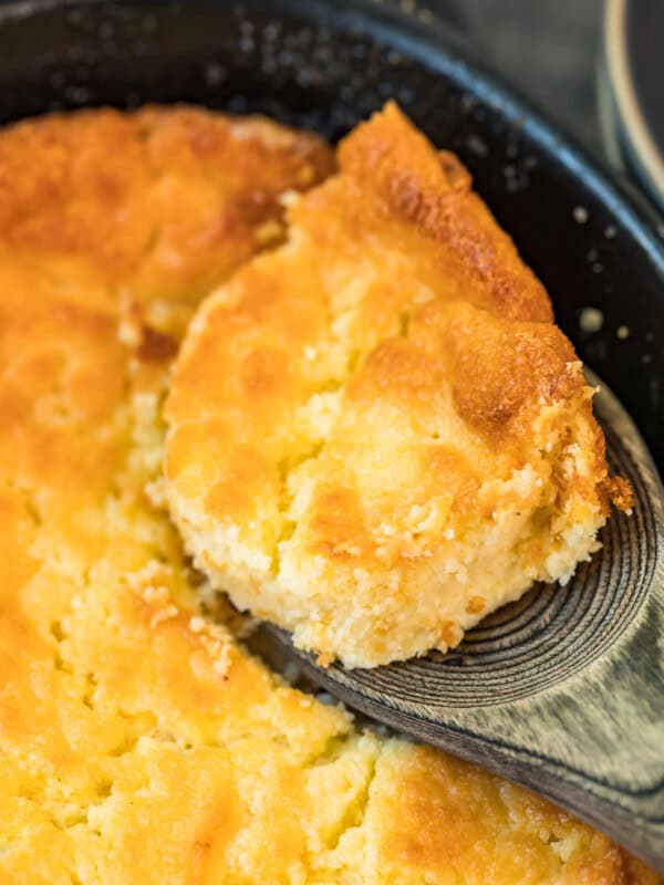 lifting up spoonful of buttermilk spoon bread