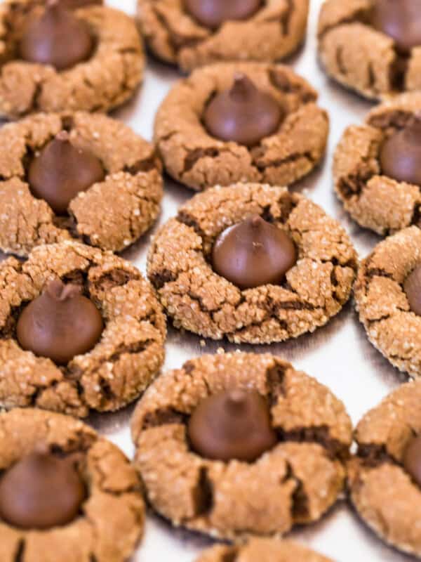 chocolate peanut butter blossoms on baking sheet