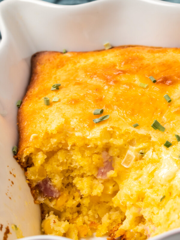 inside of loaded cornbread casserole with cheese and diced ham