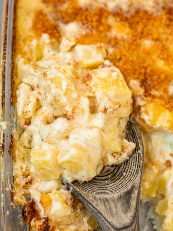 spoon digging into parmesan creamed potatoes