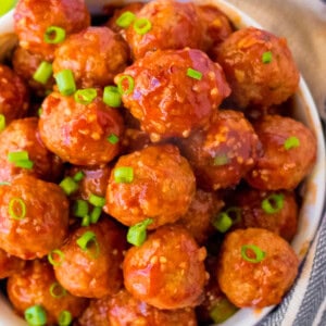 up close bowl of crockpot honey garlic meatballs