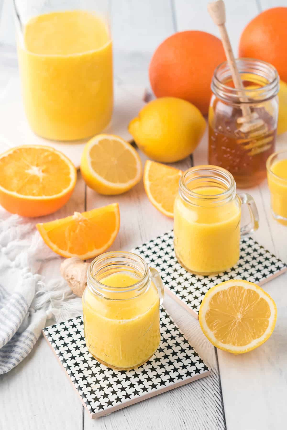 orange ginger shot on table