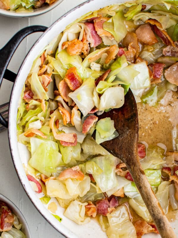 wooden spoon in cabbage and bacon