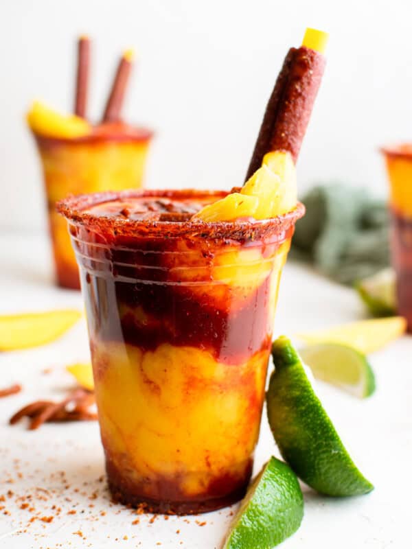 layered mangonadas in plastic cups