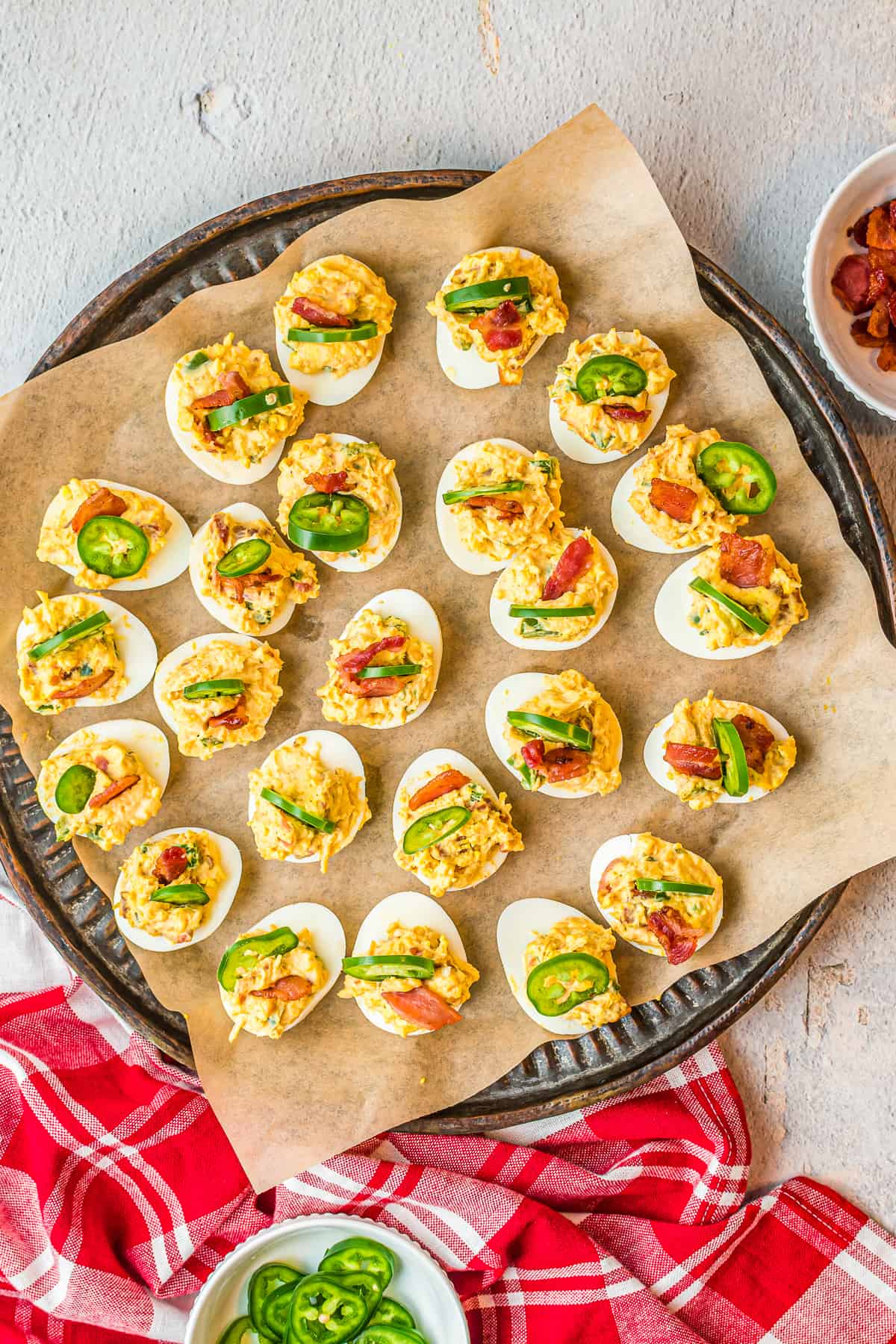 jalapeno popper deviled eggs on platter