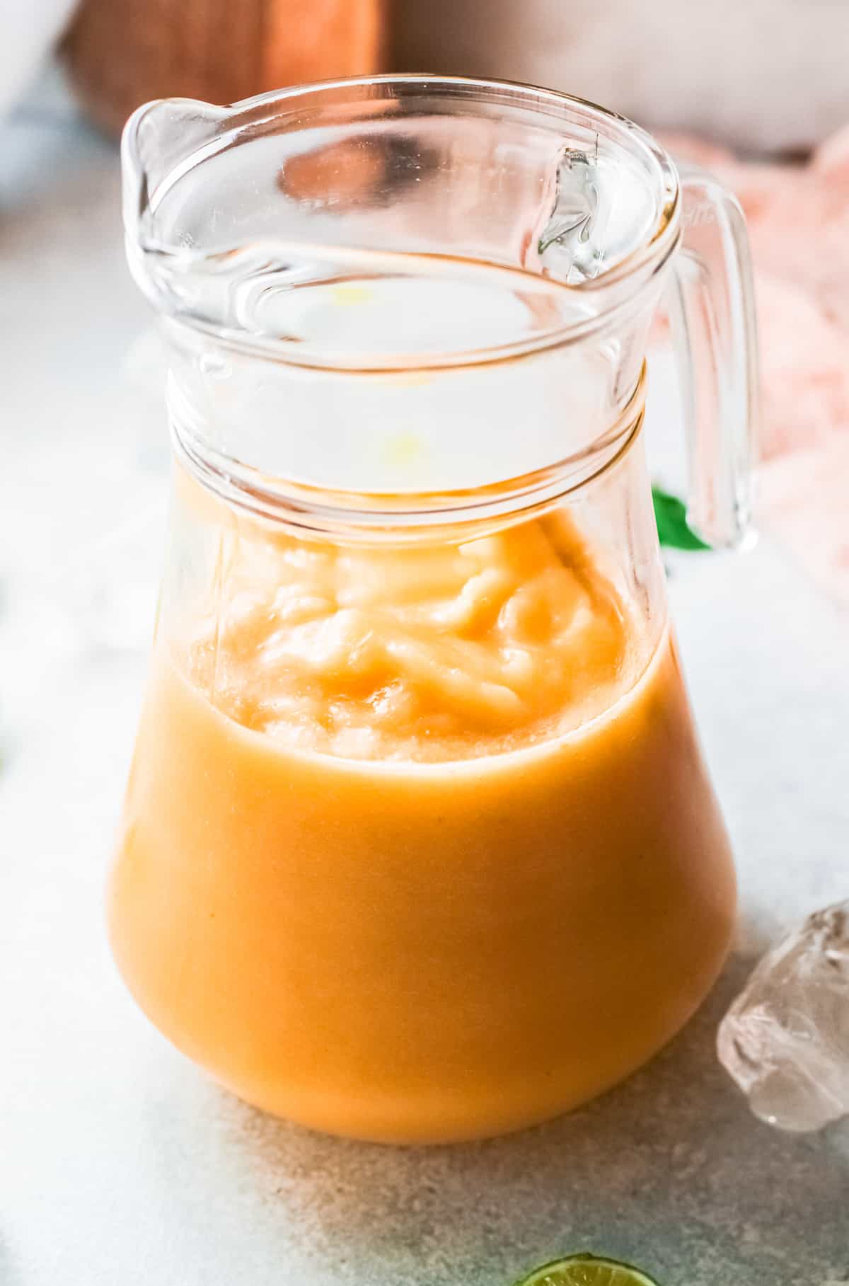 pitcher of frozen peach margaritas