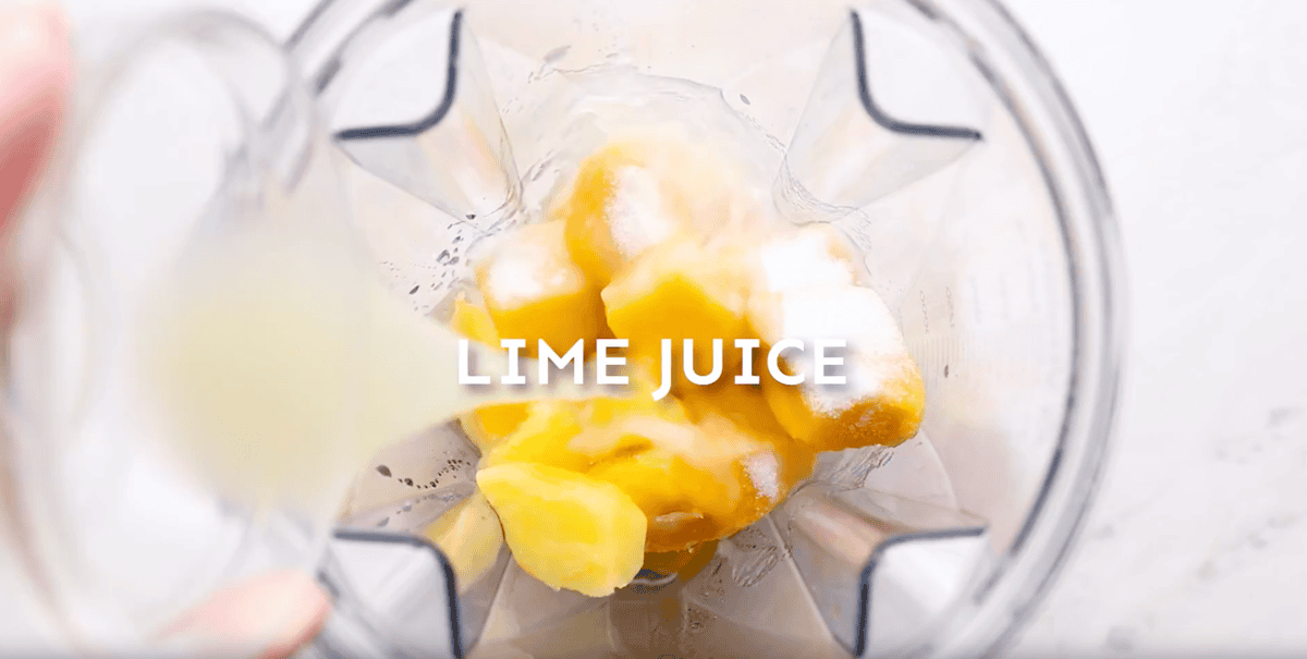 mango chunks, sugar, water, and lime juice in a blender.