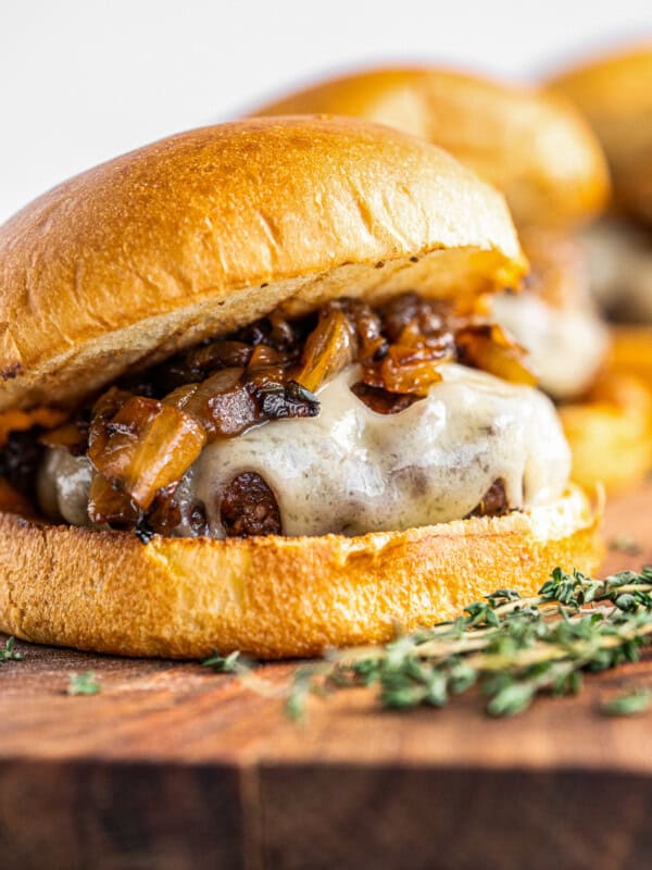 up close image of caramelized onion swiss burger