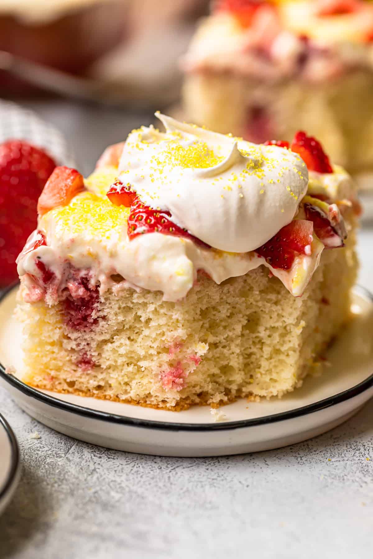 Strawberry Lemonade Poke Cake - The Cookie Rookie®
