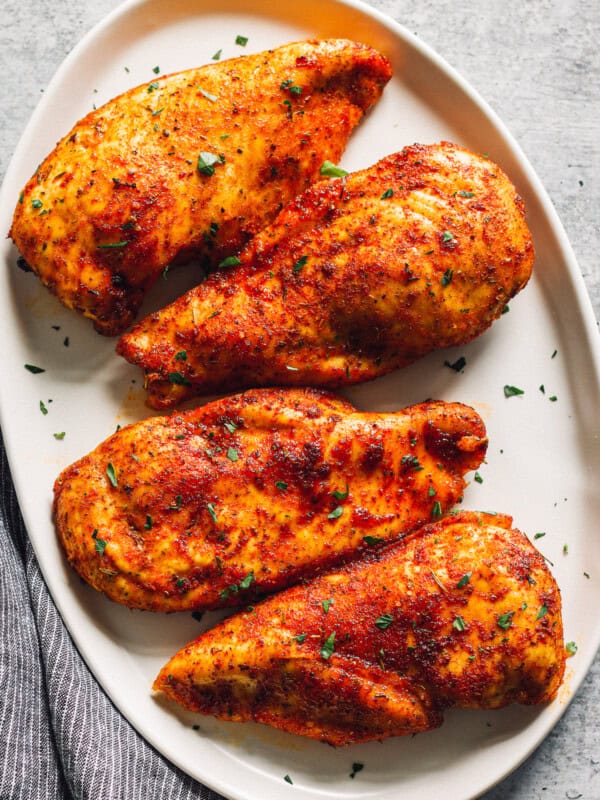 baked chicken breasts on serving platter