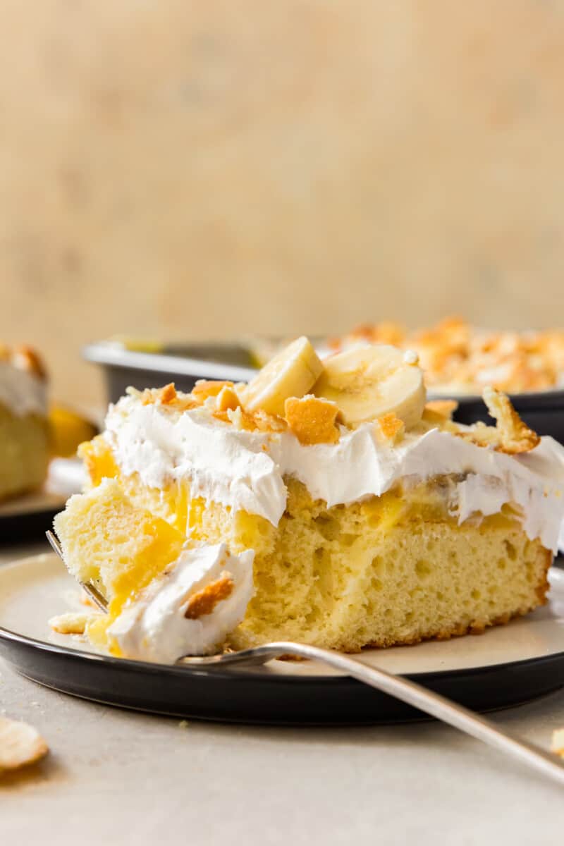 bite out of banana pudding poke cake