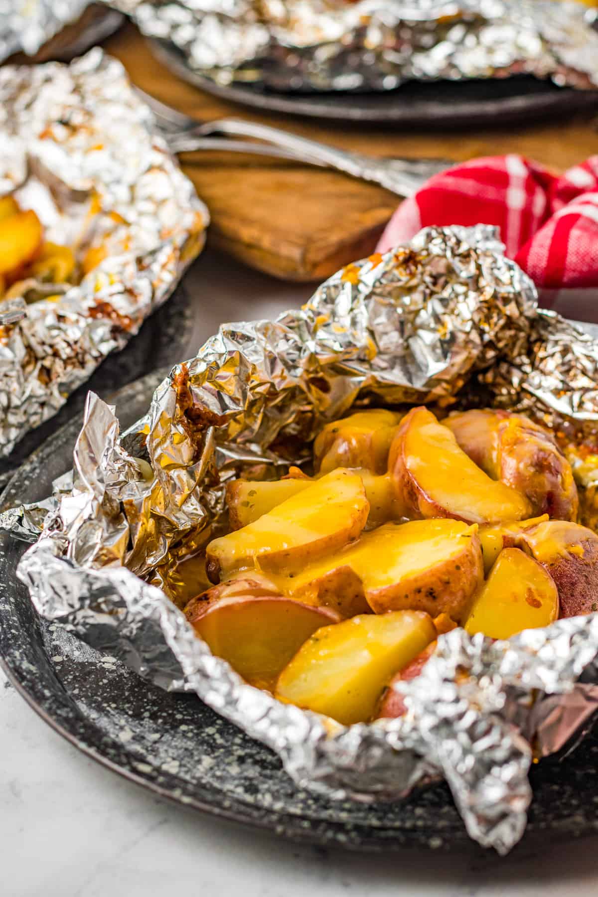 grilled ranch potatoes with cheese in foil packet