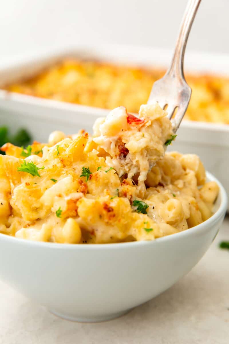 bowl of lobster mac and cheese with fork