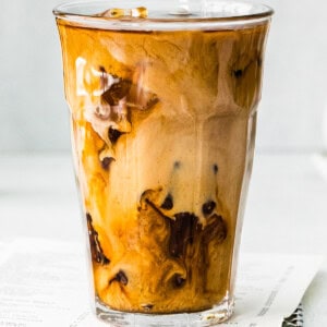 up close pumpkin cream cold brew in glass cup