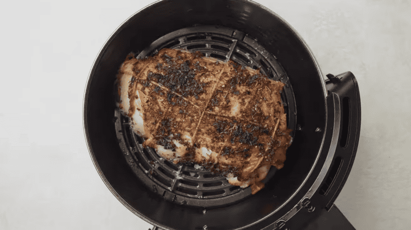 herb rubbed turkey breast in an air fryer.