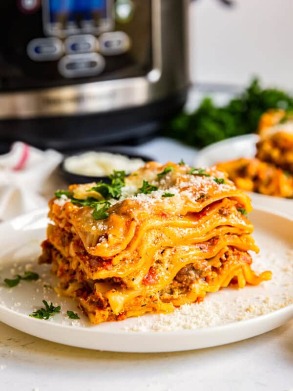 crockpot lasagna next to slow cooker